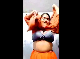 Big boobs desi girl removing suit and showing melons